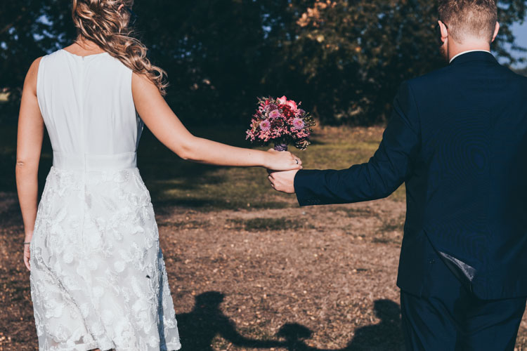 Couple holding hands